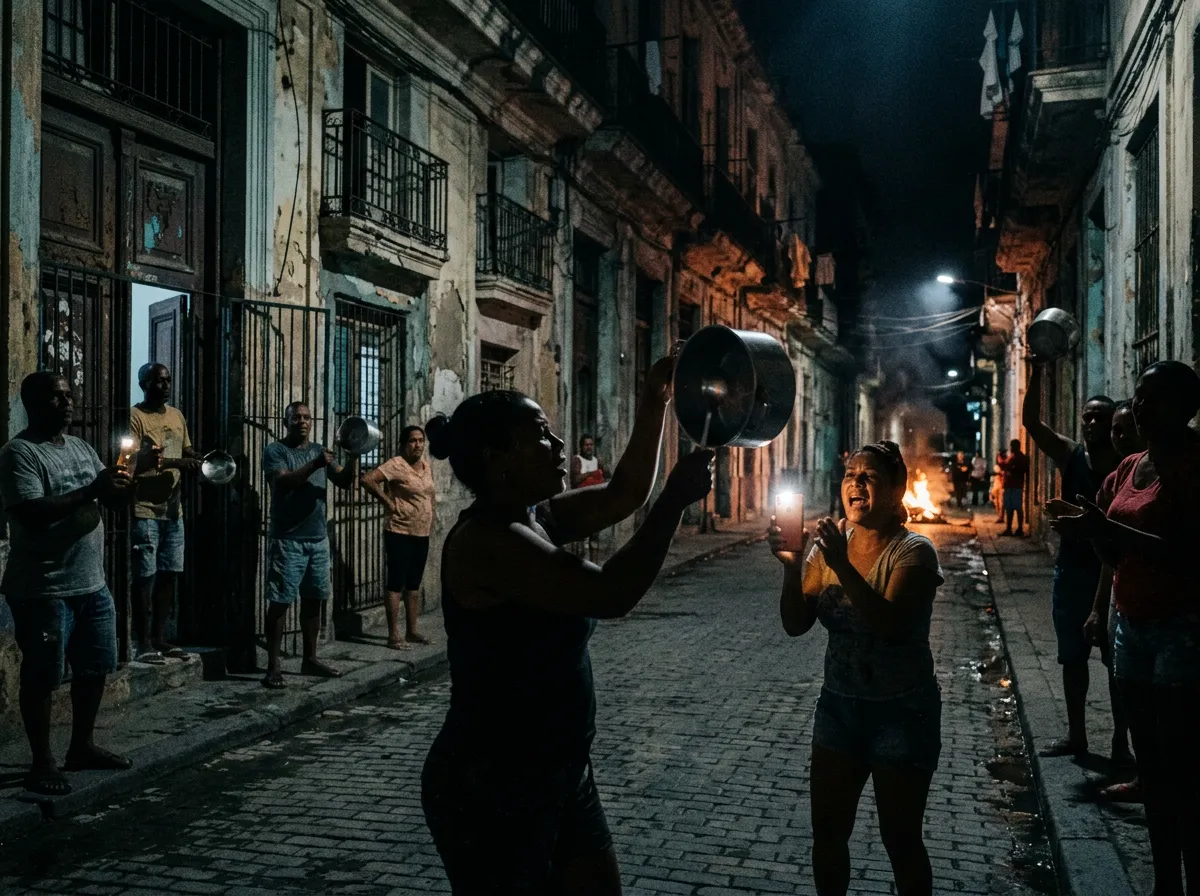Cuban protesters banging pots and pans on a dark Havana street at night
